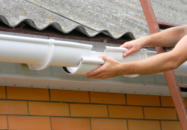 Gutter Hanging in Winter Park